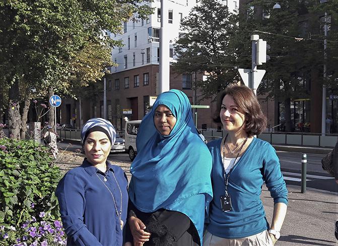Women to Work project employees Zainab Al-Ali, Suhuur Musse and Marina Rinas.